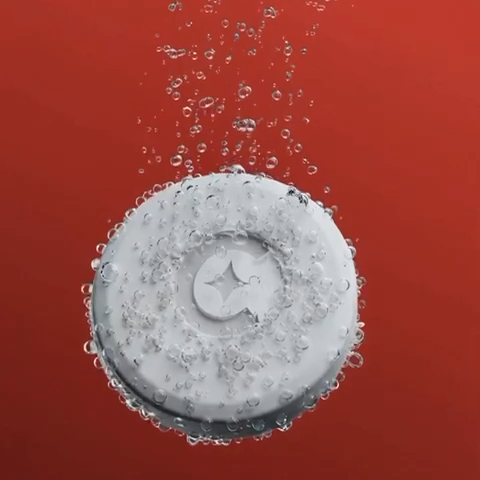 A dry serum tablet surrounded by bubbles